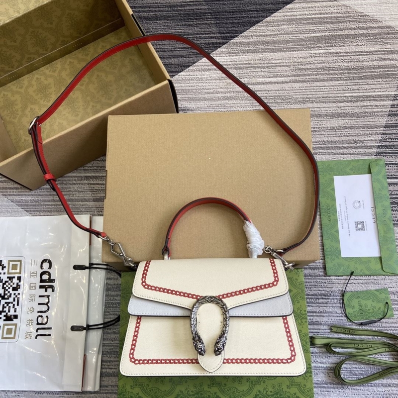 G*u*i top handle bags